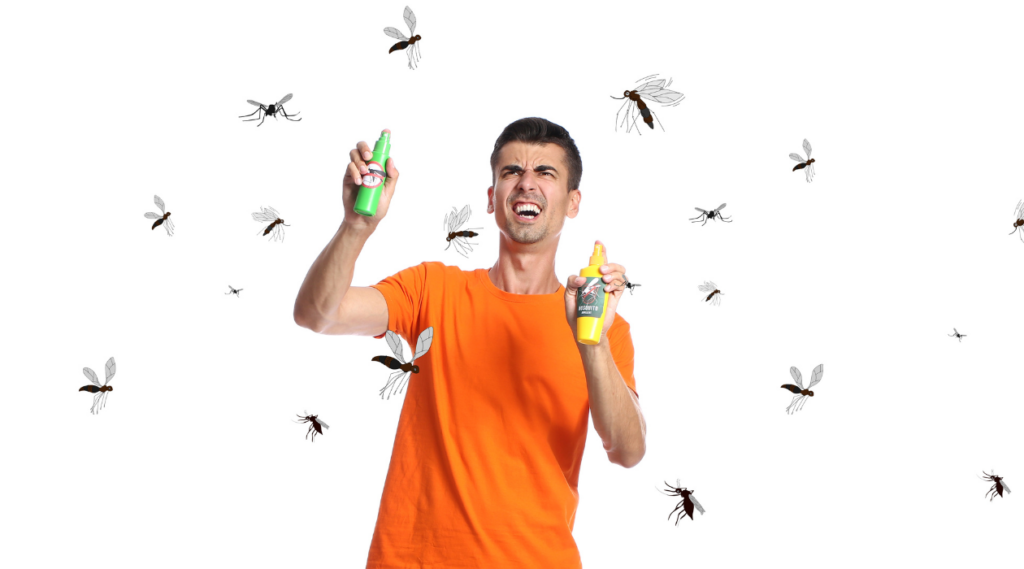 man spraying repellent chaotically at mosquitoes 